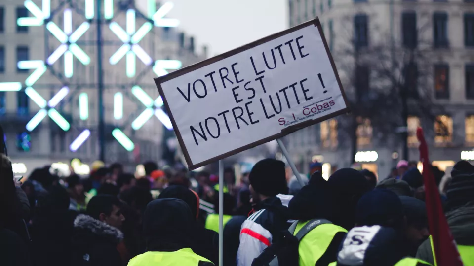 People protesting on the street in France. Photo: Unsplash.