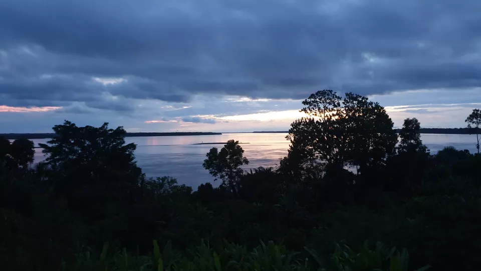 Amazonas sunset, trees and river in view. Photo: Torsten Krause.