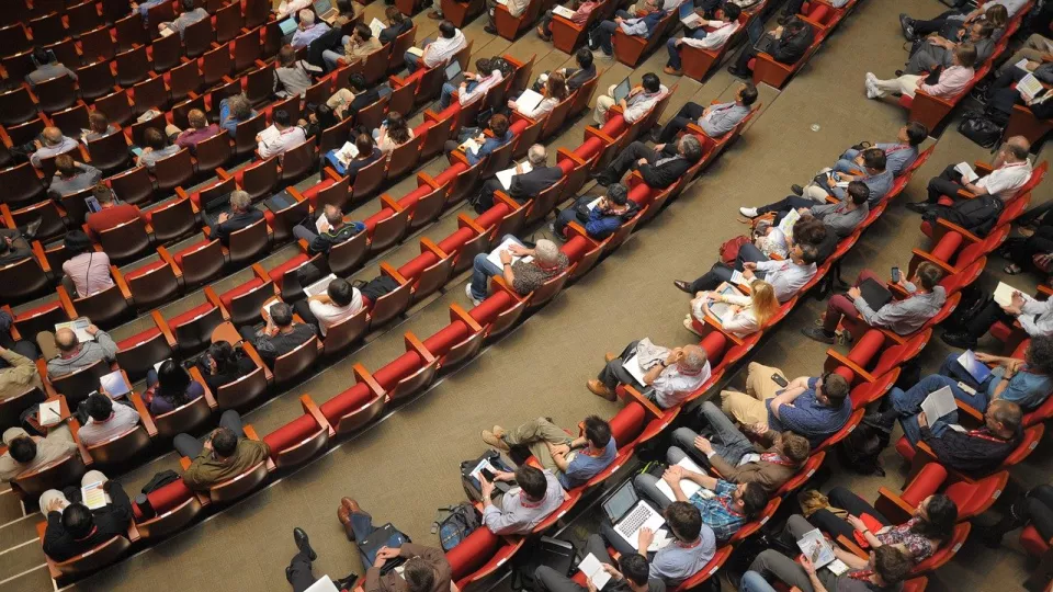 Audience at a conference. Photo.