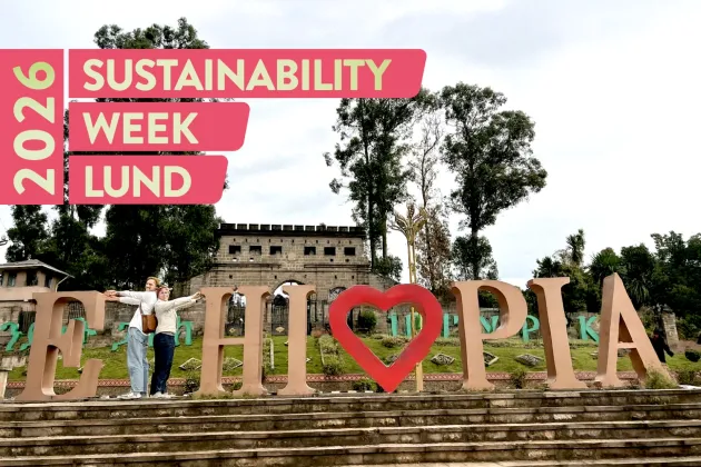Two people forming a T in the word Ethiopia. Photo.