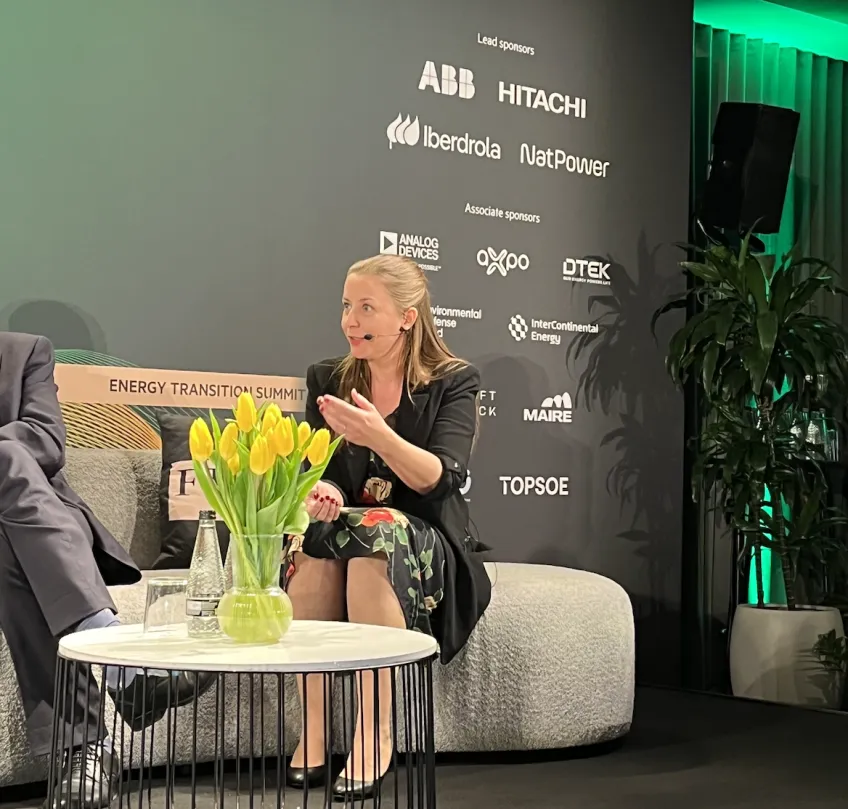 A woman sitting on a stage at the FT Energy Transition Summit in London representing ABB Energy Industries. The summit took place in October 2025. Photo.